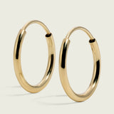 Tiny 14k Gold Endless Round Hoop Earrings